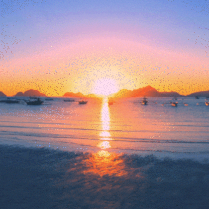 Animação pairando o oceano com barcos e um céu laranjado pelo sol